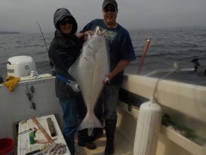 Women catches 50lb Halibut Fishing Port Hardy